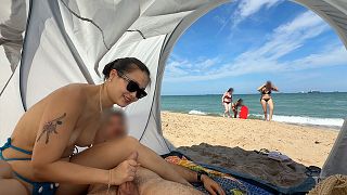 Making him cum in a public beach, with people passing by!