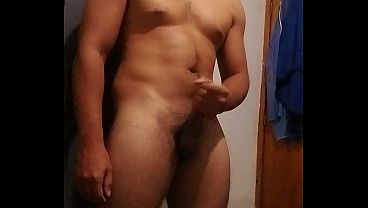 Young man masturbating